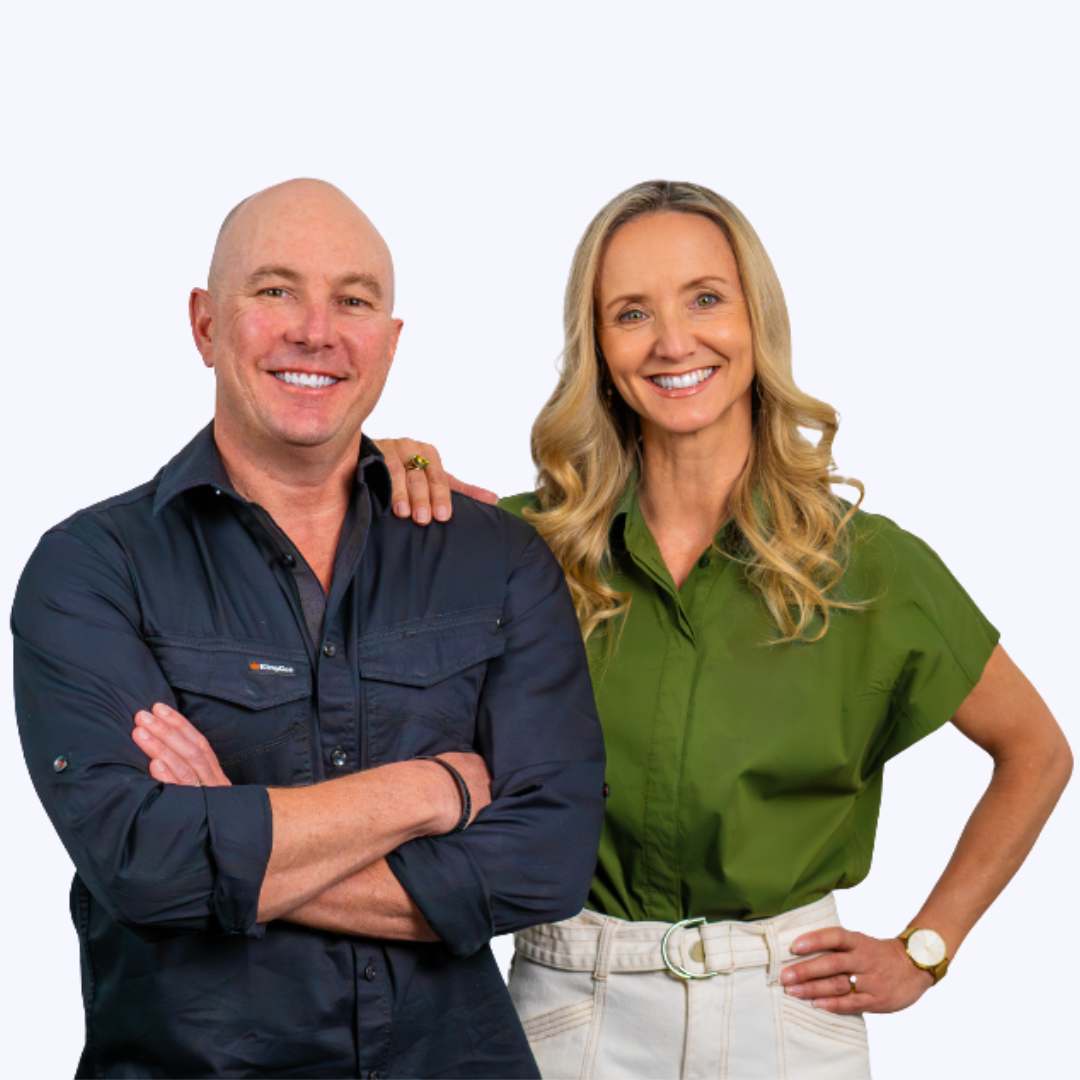 Andy and Angela Smith, founders of Lifestyle Tradie, smiling and standing together