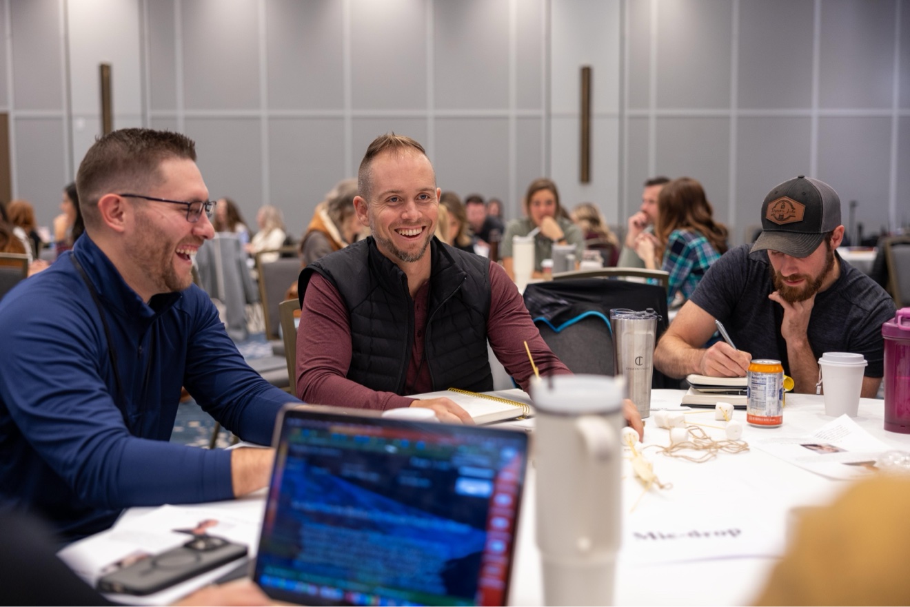 Members working through implementation at a table