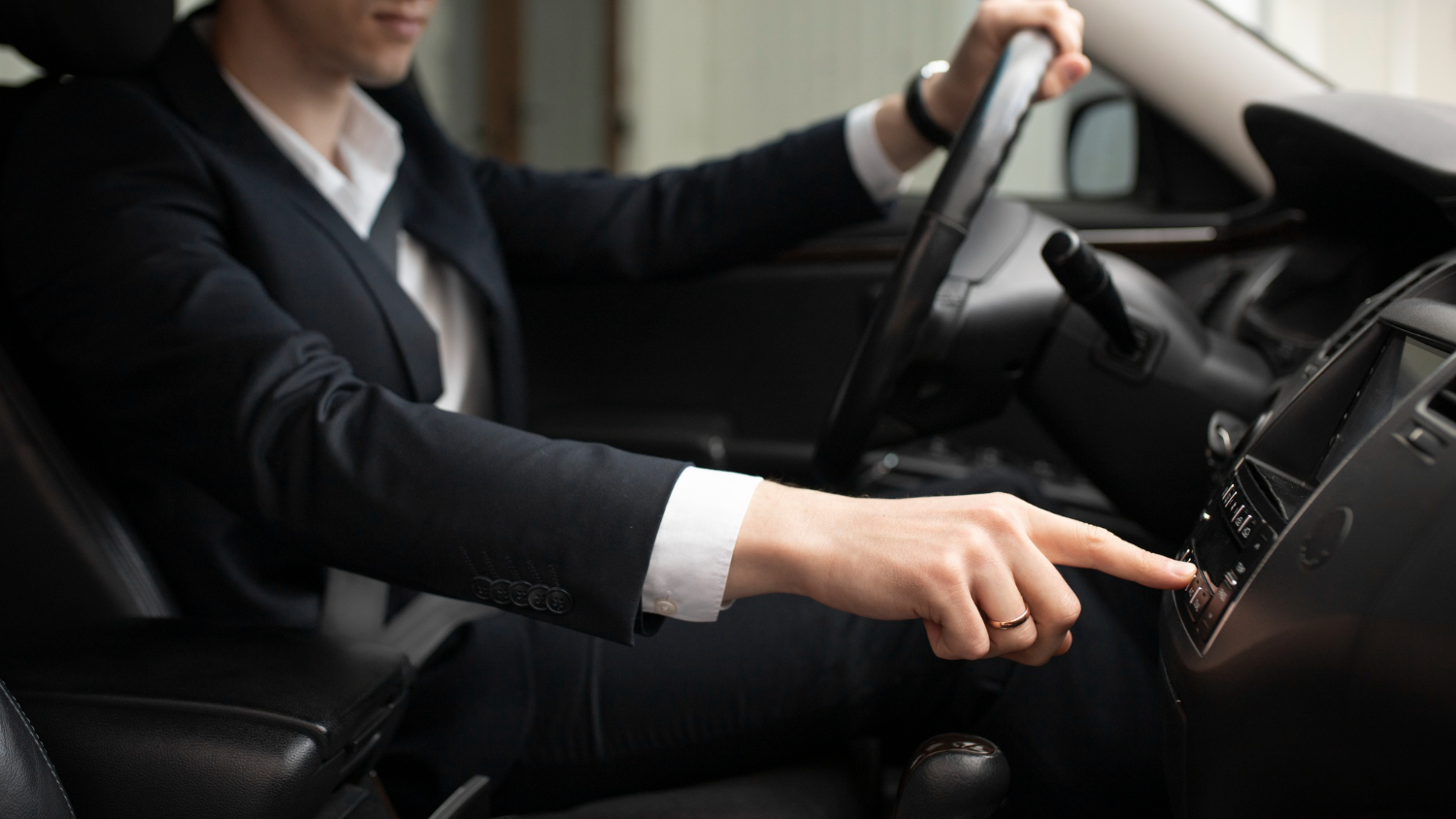Passenger and chauffeur beside vehicle