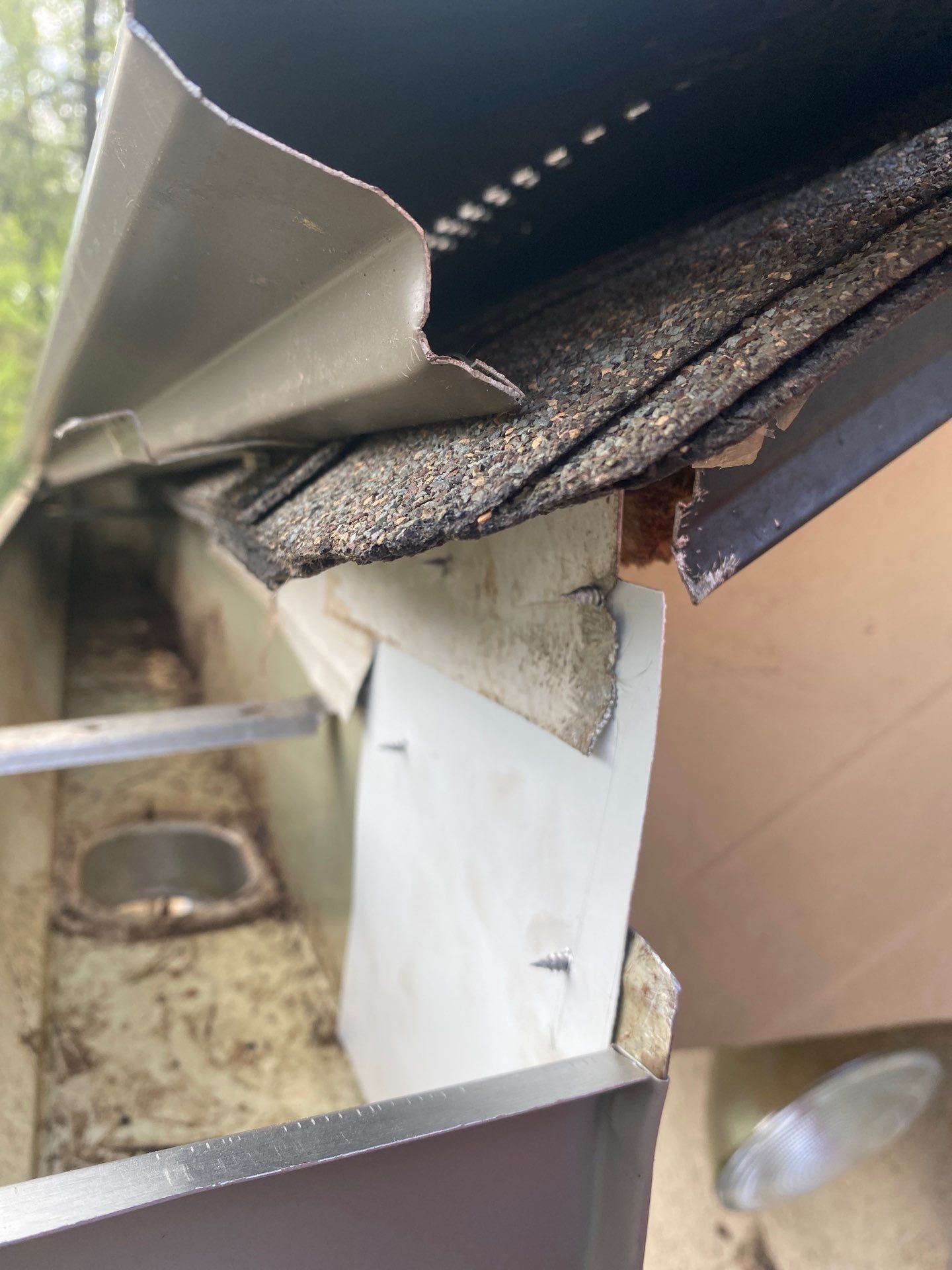 Measuring a run of gutter along a roofline