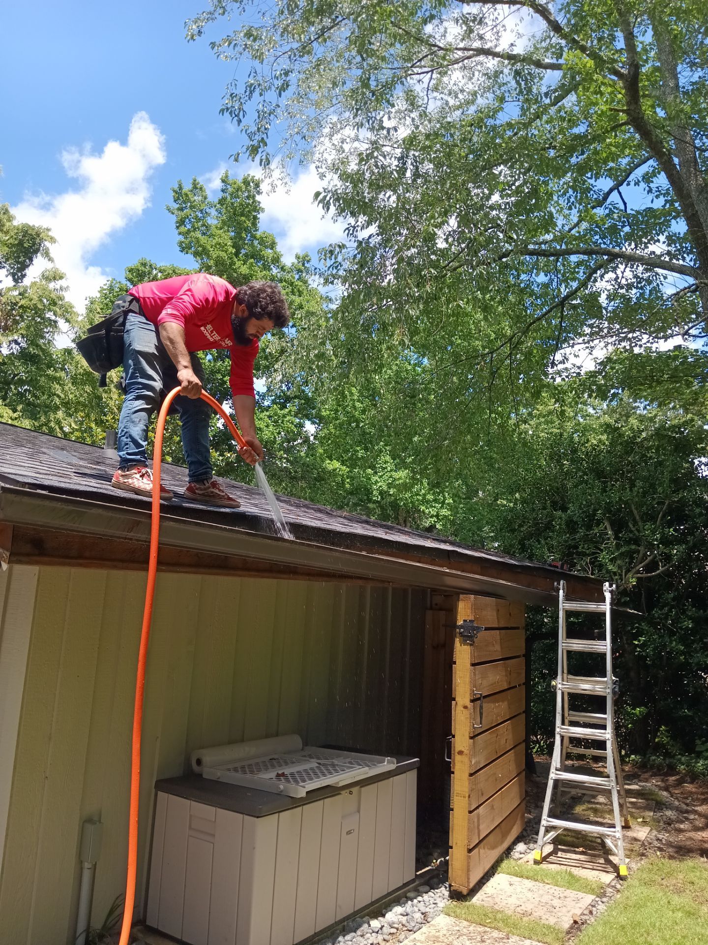 Inspecting the fascia behind a damaged gutter run