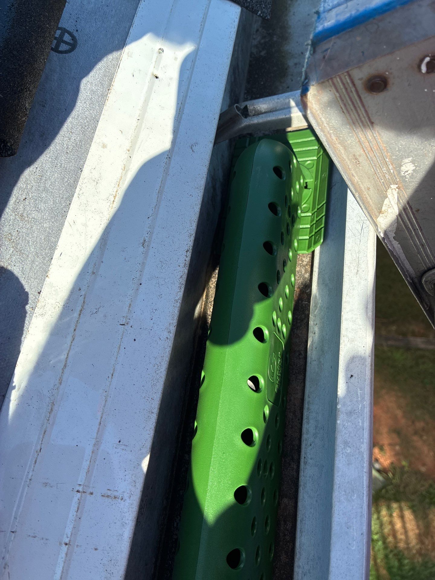 Checking gutter pitch and channel width before fitting an insert