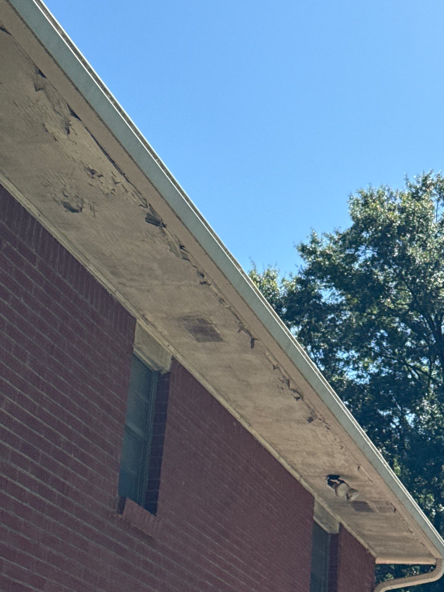 Clean, intact soffit corner after replacement