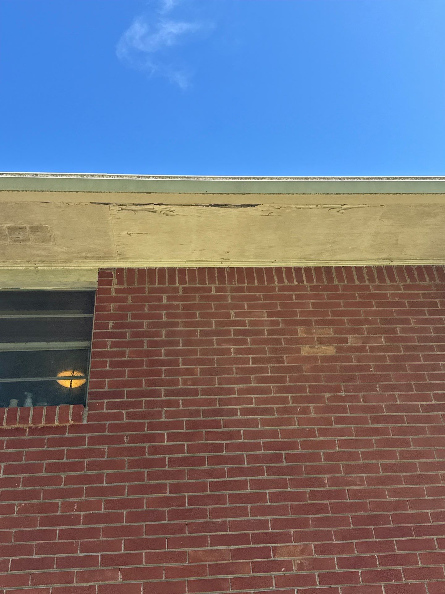Brick gable end with the soffit line above