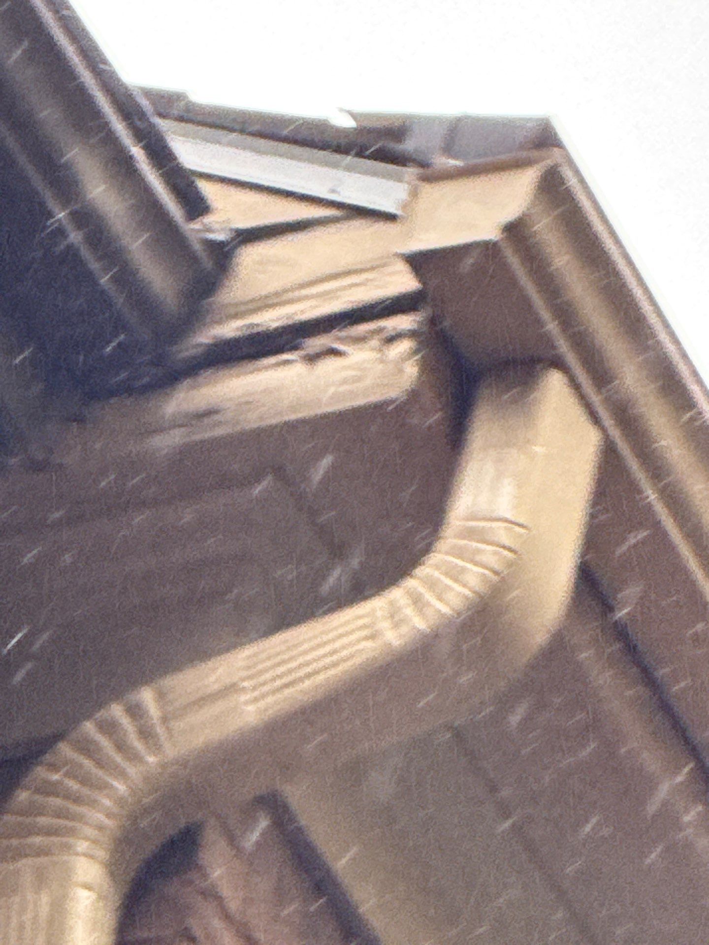 Gutter and fascia corner joint close up