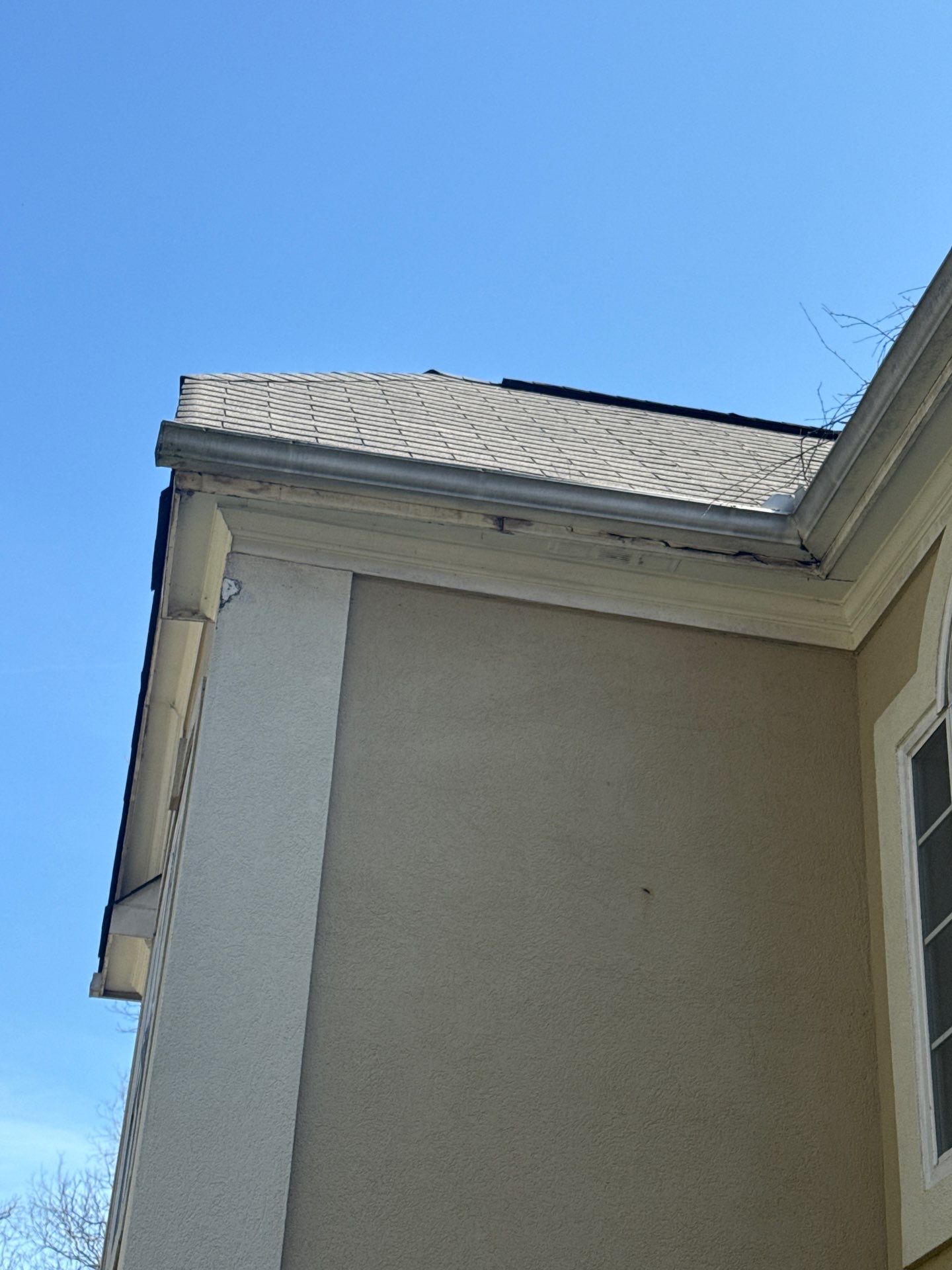 Roof edge and fascia line on a stucco home