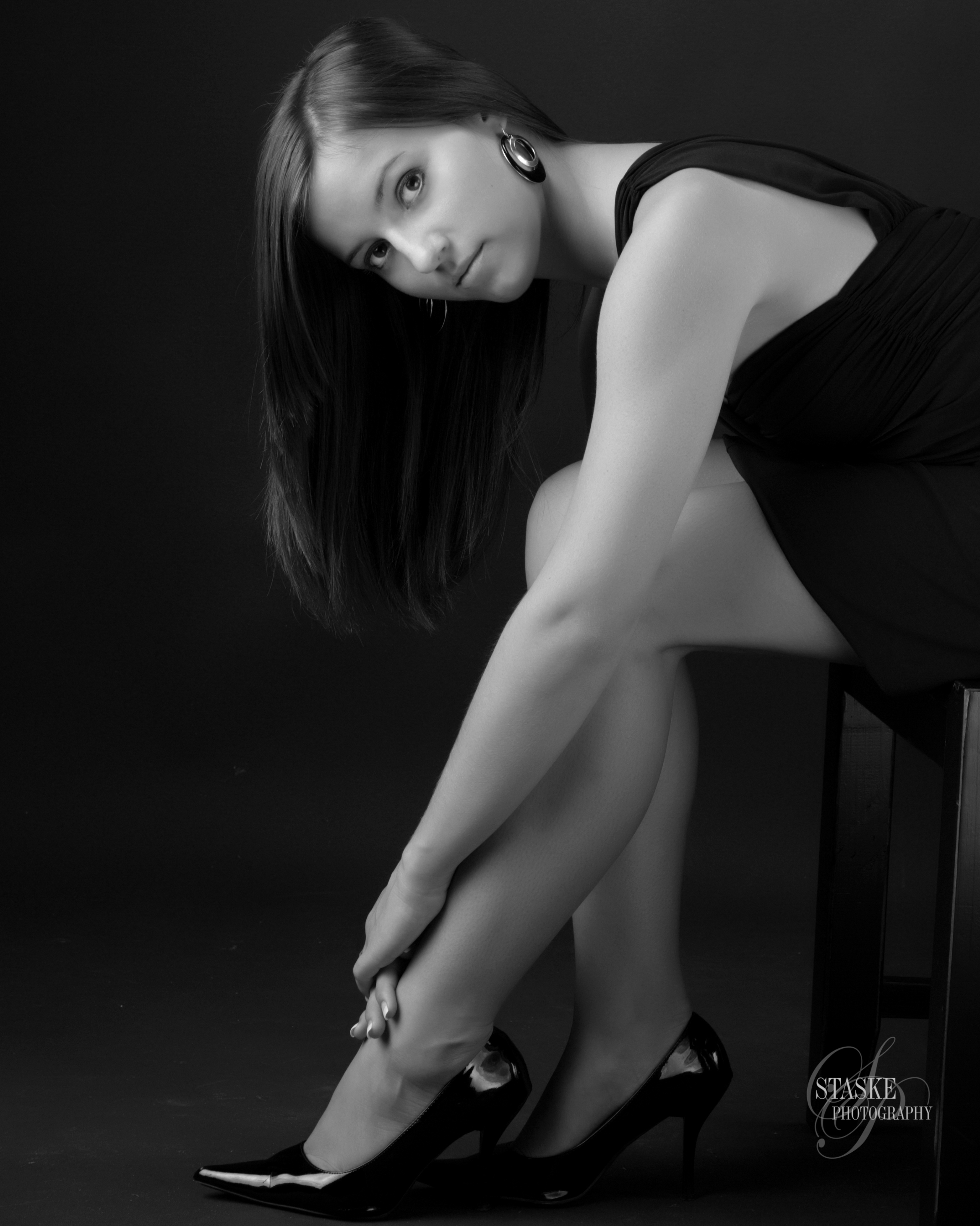 Graduating high school senior portrait photography celebrating achievements