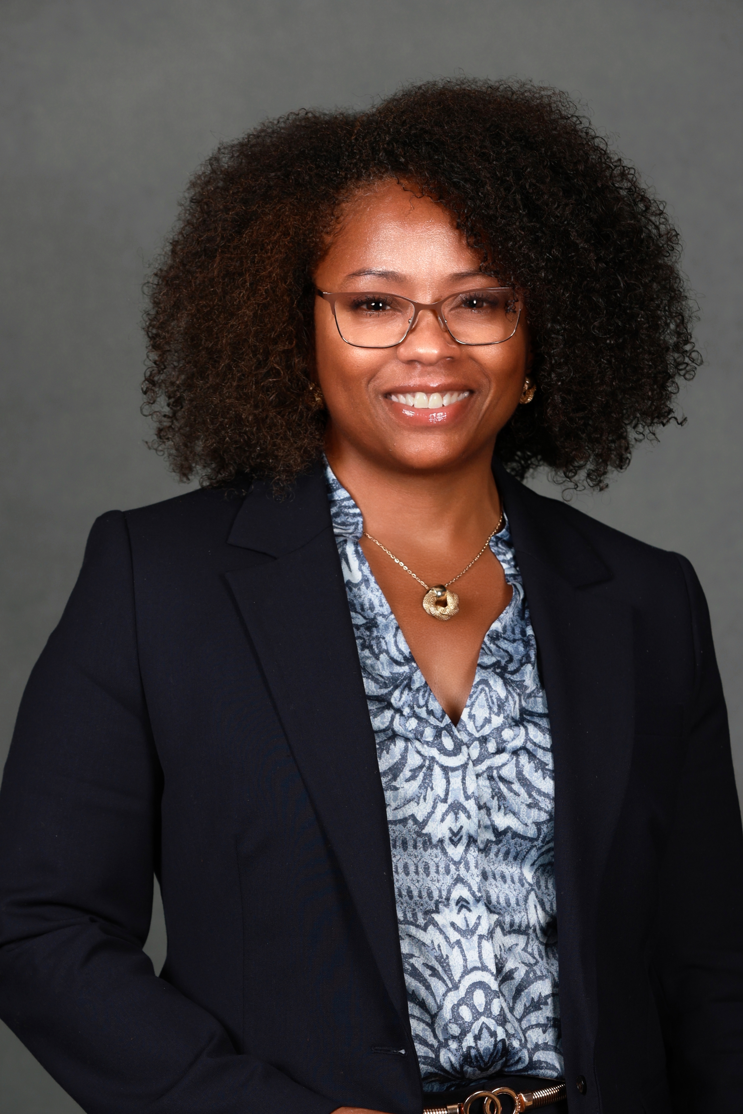 Professional corporate executive headshot photography on studio background
