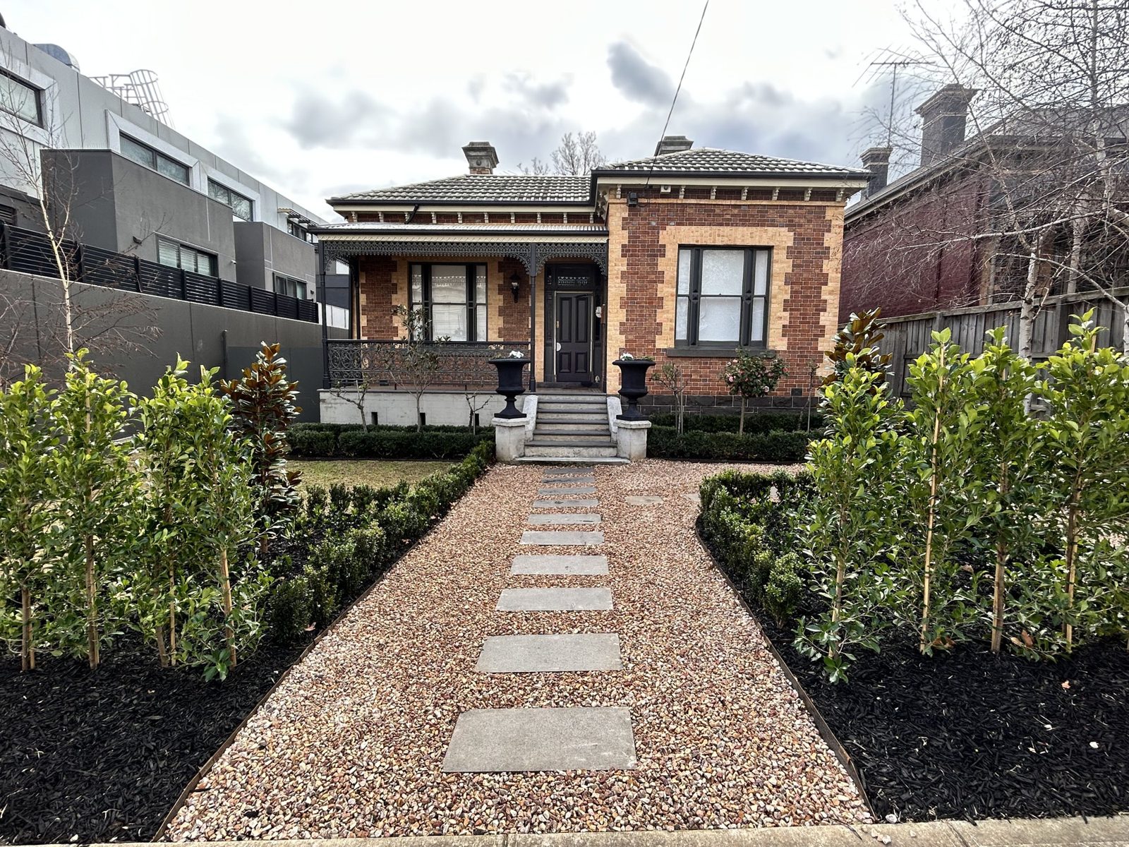 Restored Victorian brick home with new front garden and path
