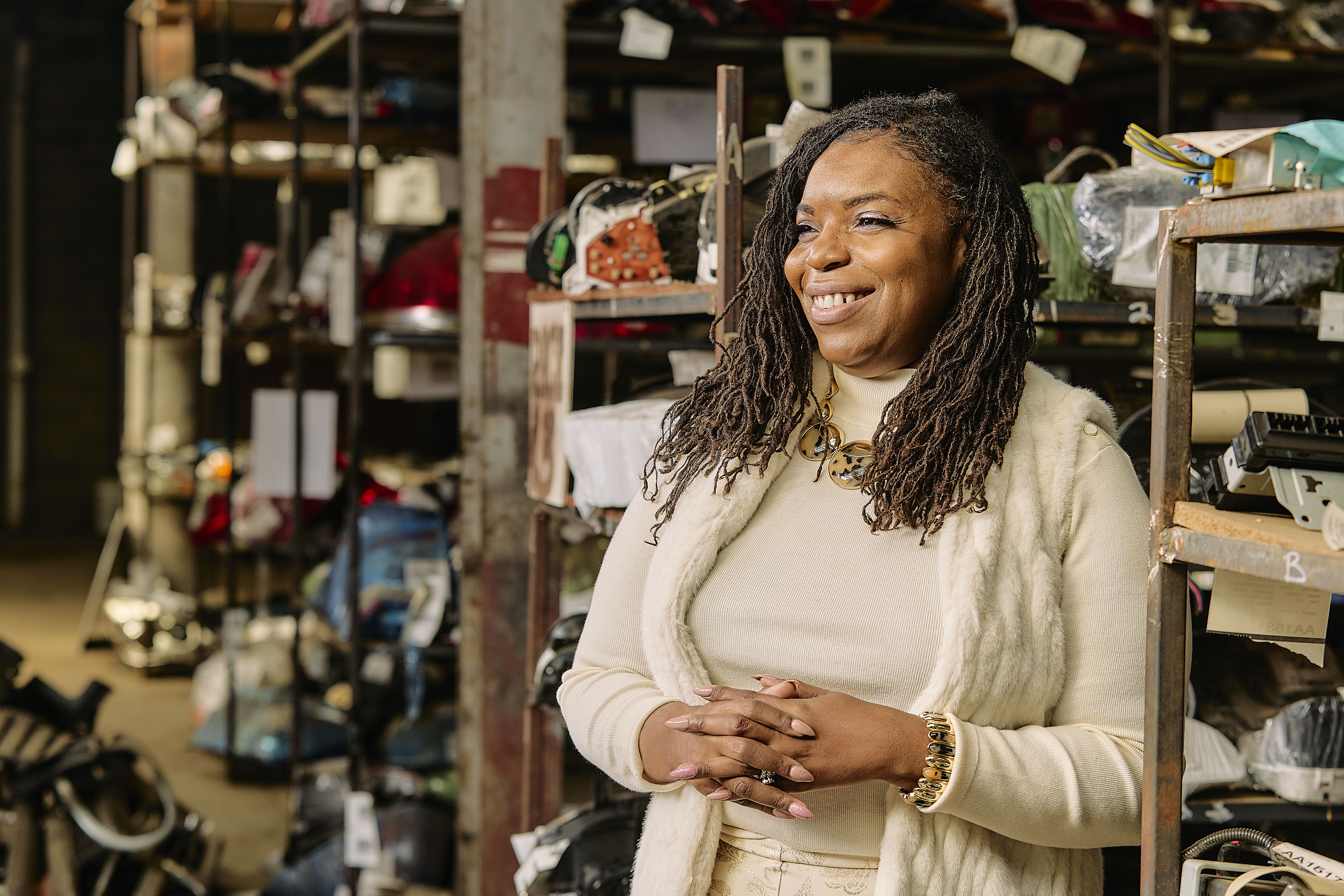 Natasha Broxton smiling inside Select Auto Parts facility