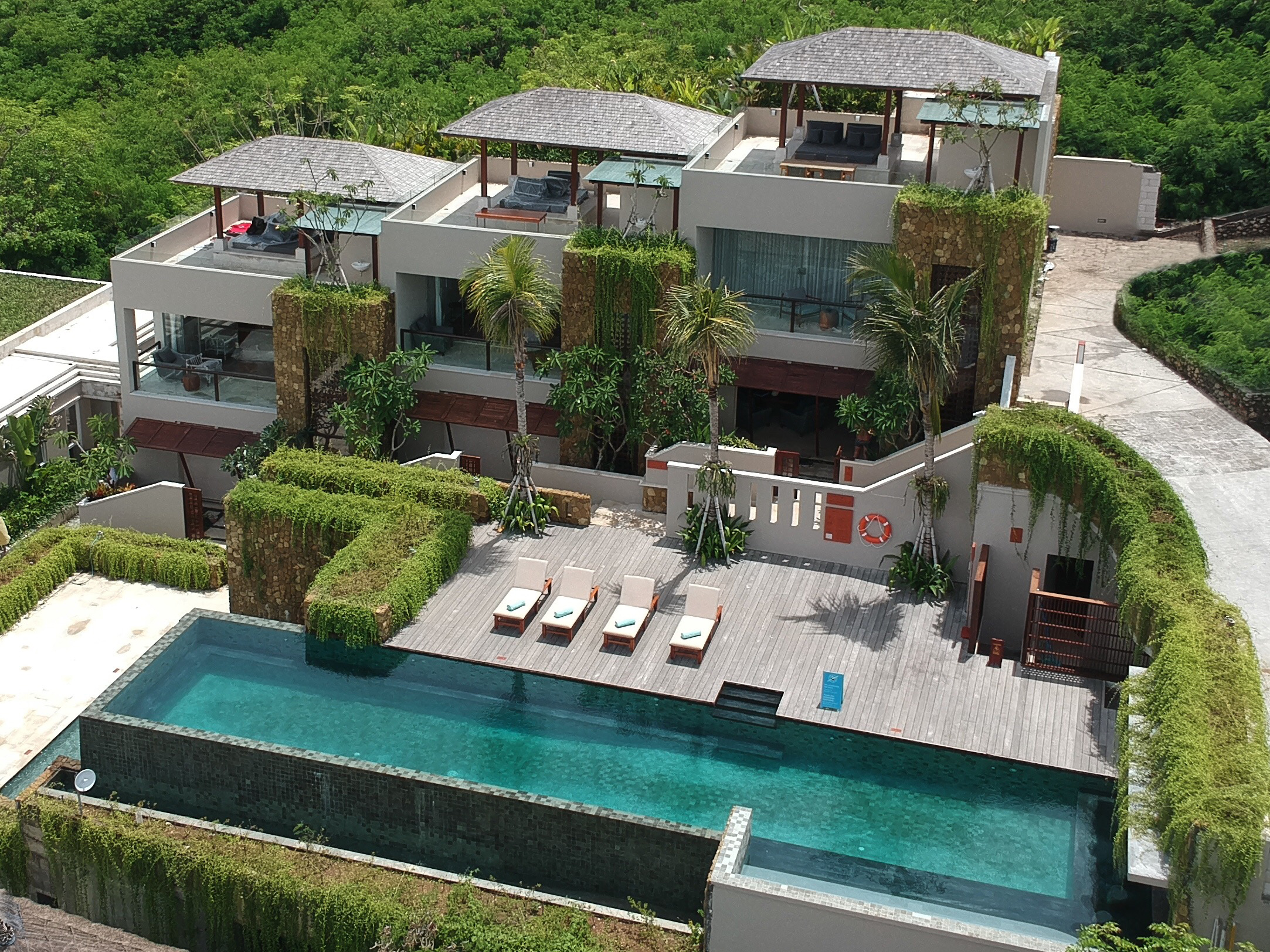 Aerial view of The Tamarind Resort luxury villas and infinity pool