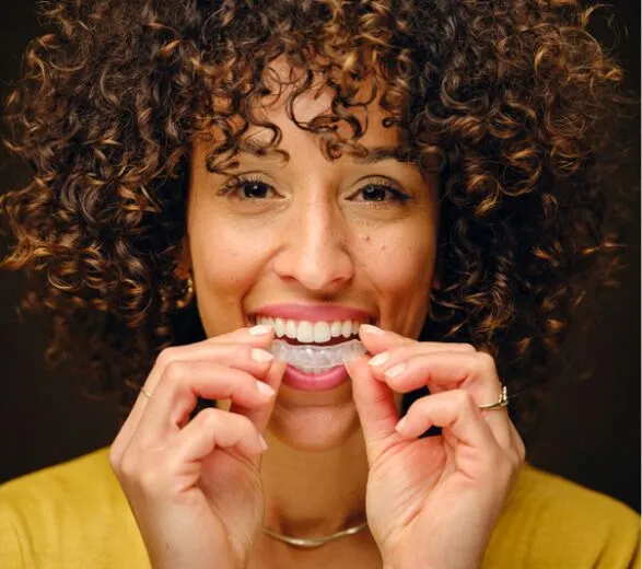 little girl smiling with braces