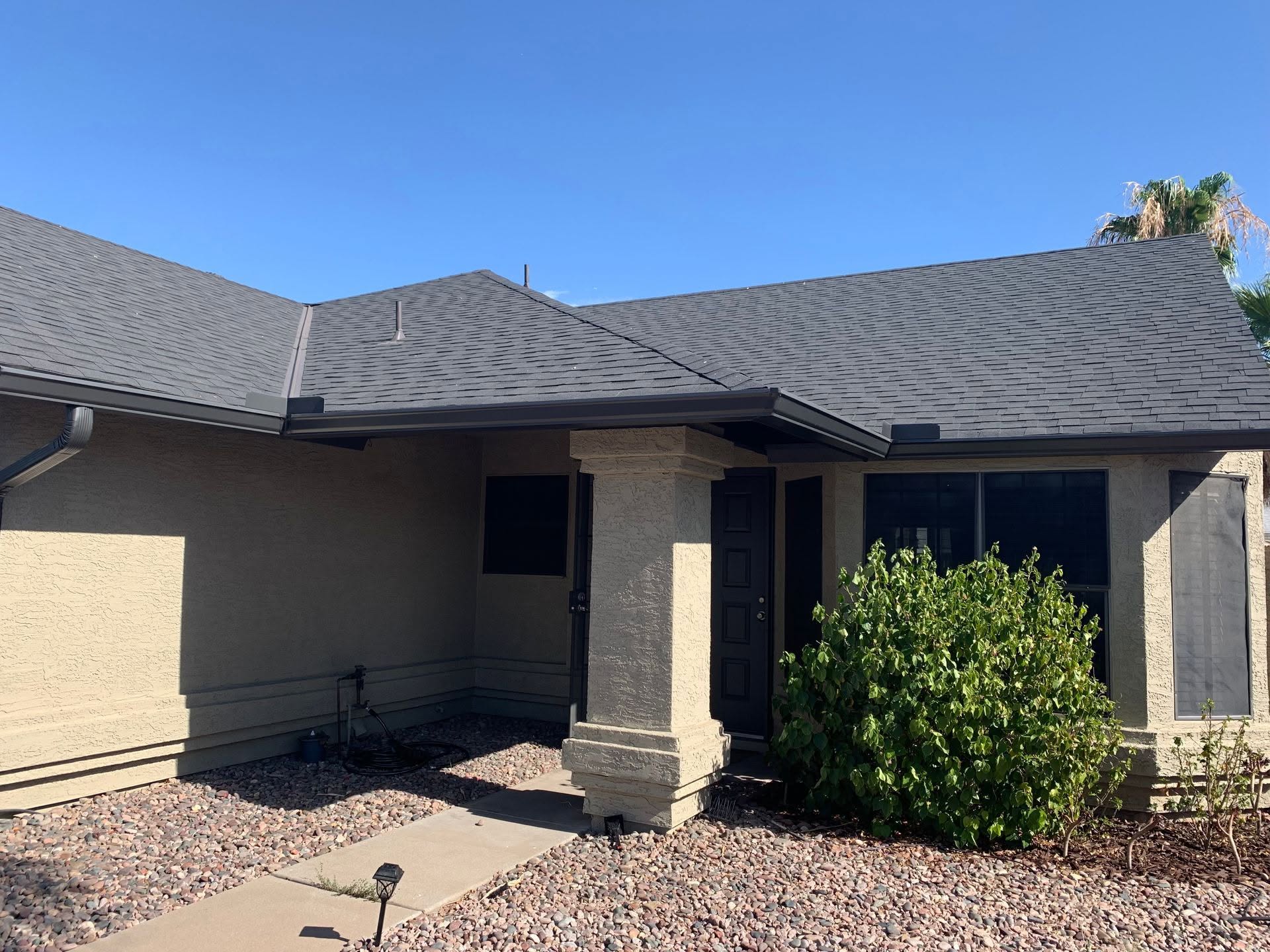 Seamless gutters along the roofline of a Phoenix home