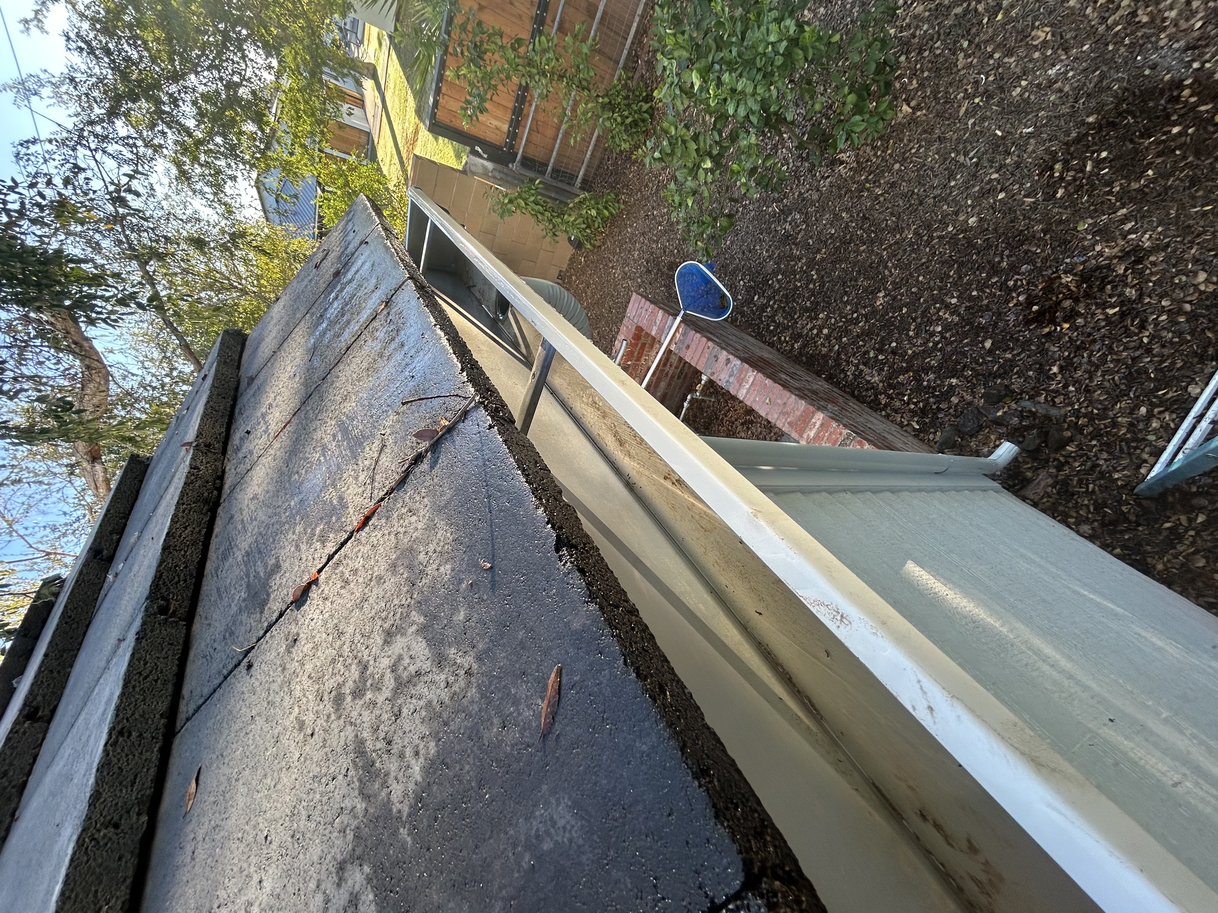 Seamless gutter cleared out and running free after a Flow-Rite clean