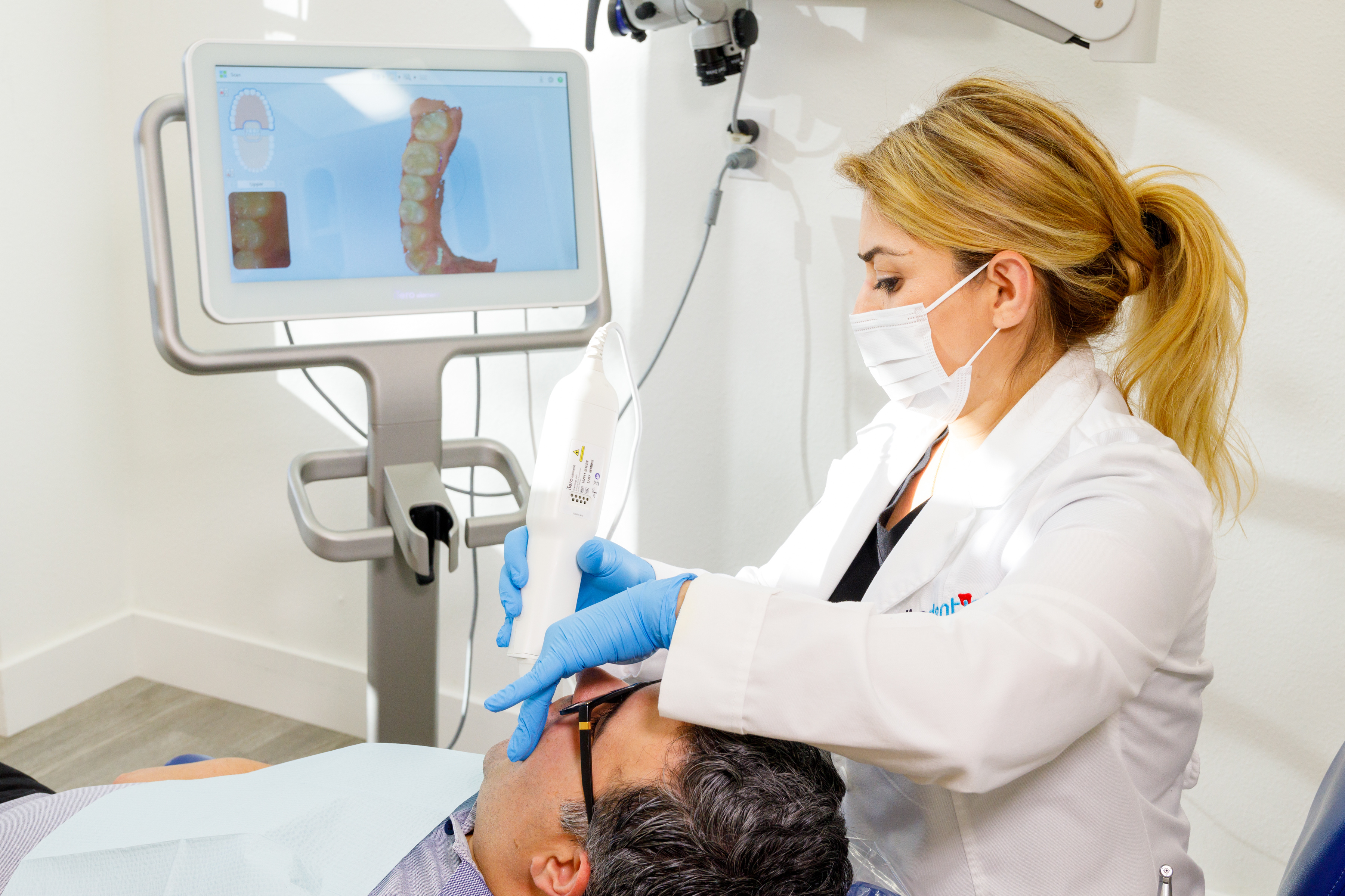 Dr. Babrood using intraoral 3D scanner