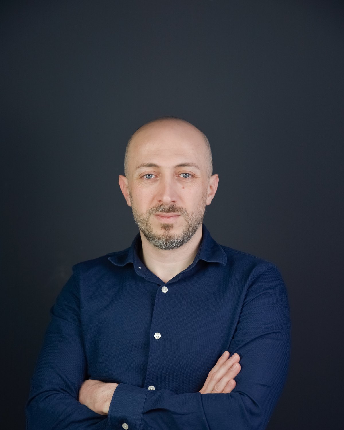 Anees Alomar, studio portrait.