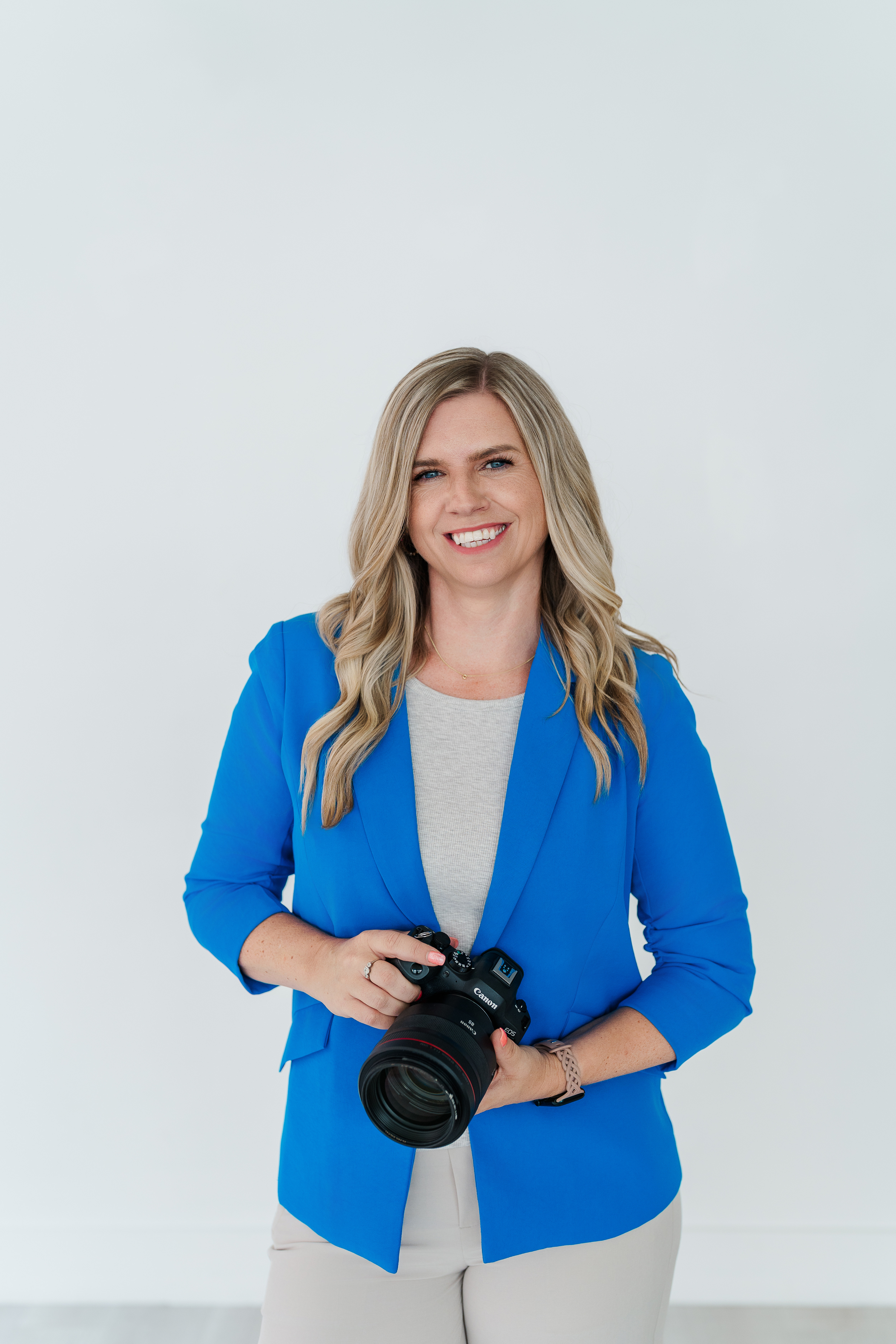 Claire Thom holding camera