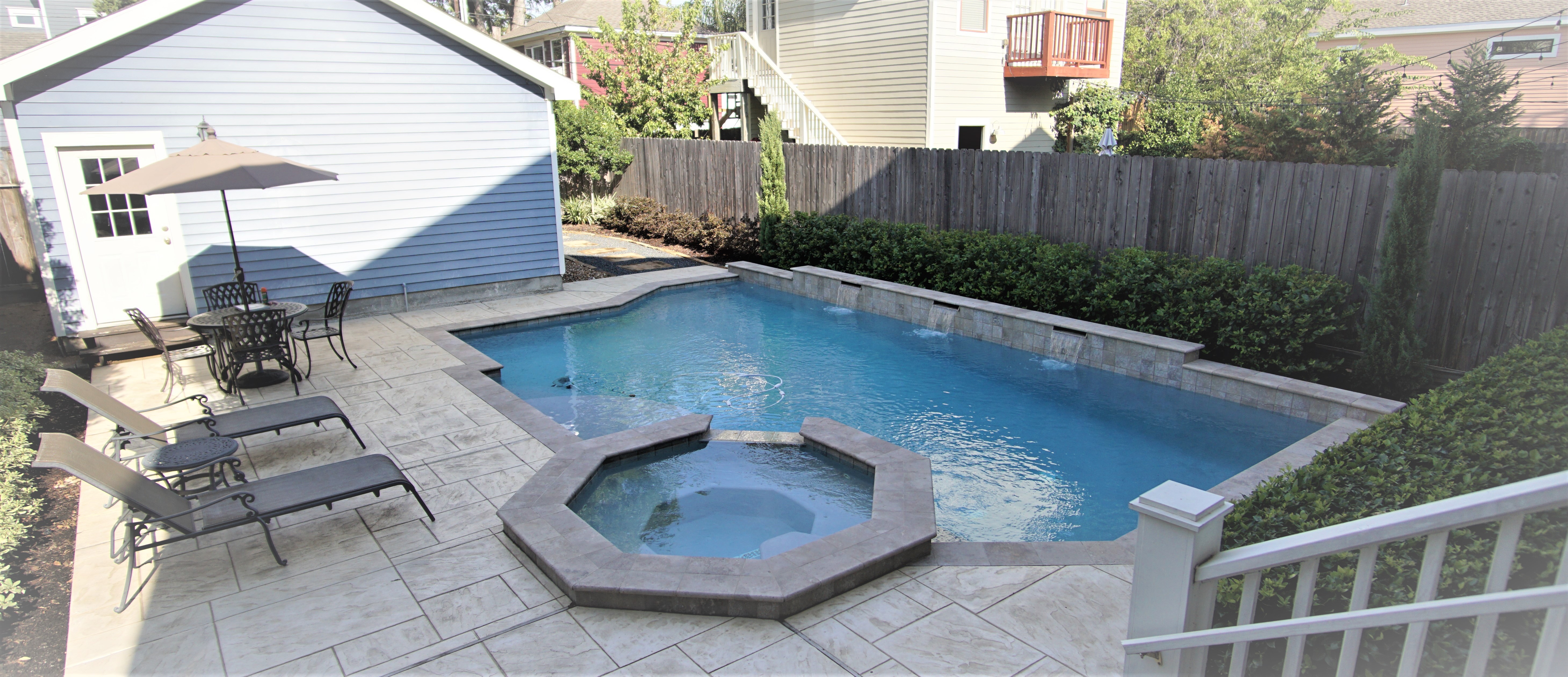 Custom gunite pool with spa built by Backyard Pool Specialists in Cypress, TX