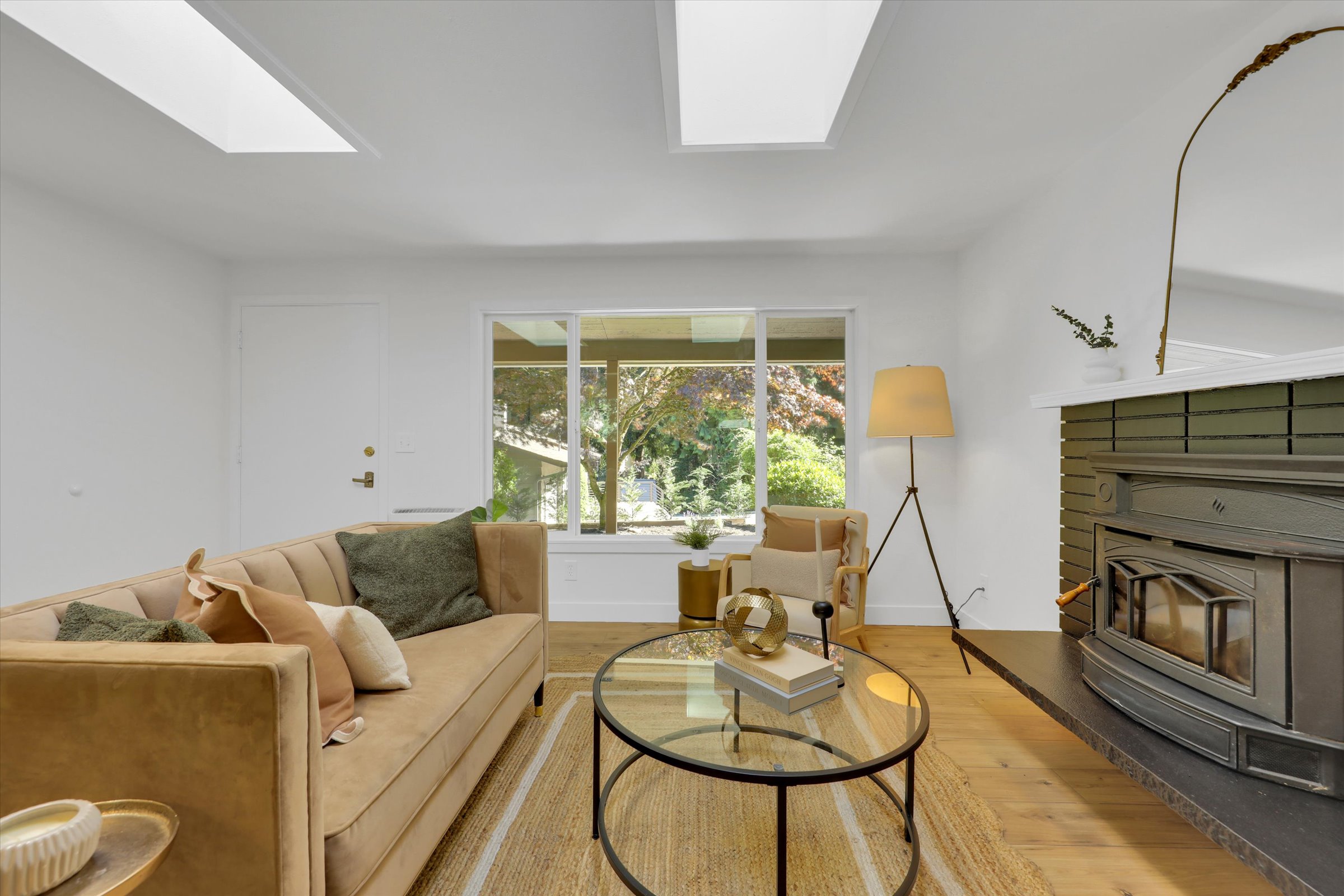 Serene Private Grounds — A half-acre paradise featuring mature landscaping, garden shed, and greenhouse.
