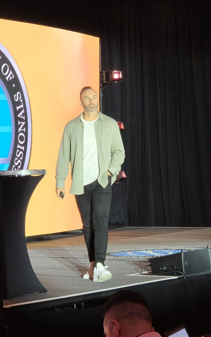 Coach Brian Fryer on stage at ANMP 2026