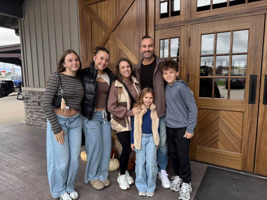 Brian Fryer with his wife Dani and their four kids