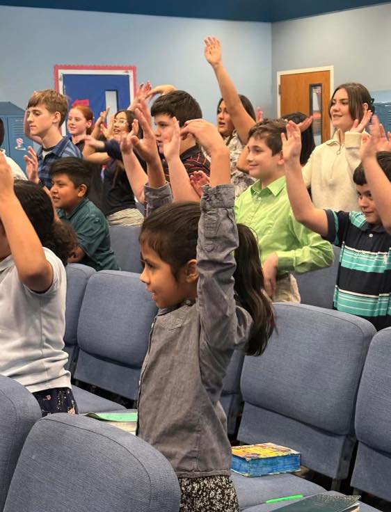 Students working together in a Bible Baptist classroom