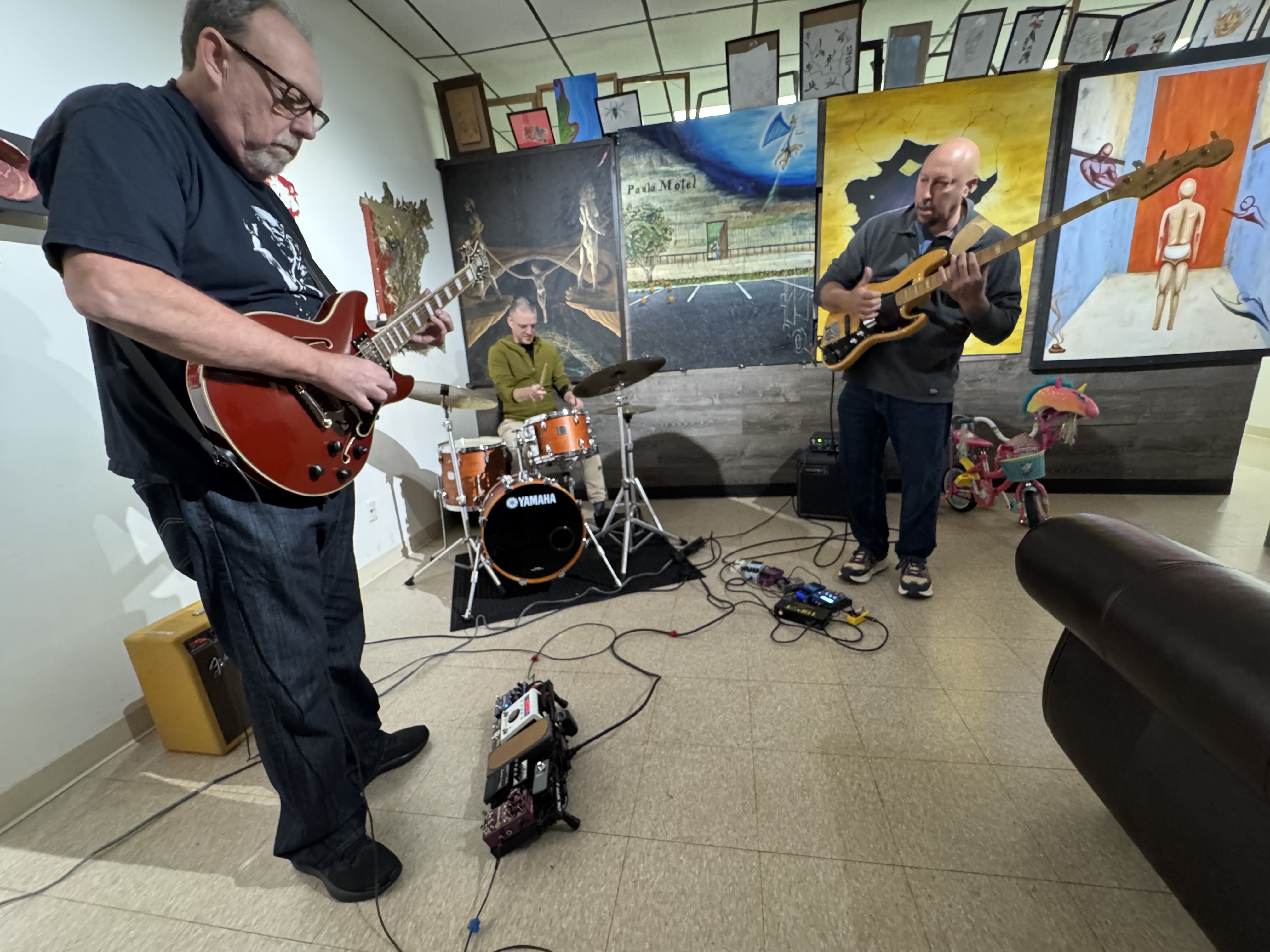 I have source images. Context: This is for a blog post about "Brian Kastan Brings a Creative Music Series to Illustrious Gallery". Style: Professional quality, photorealistic, high resolution