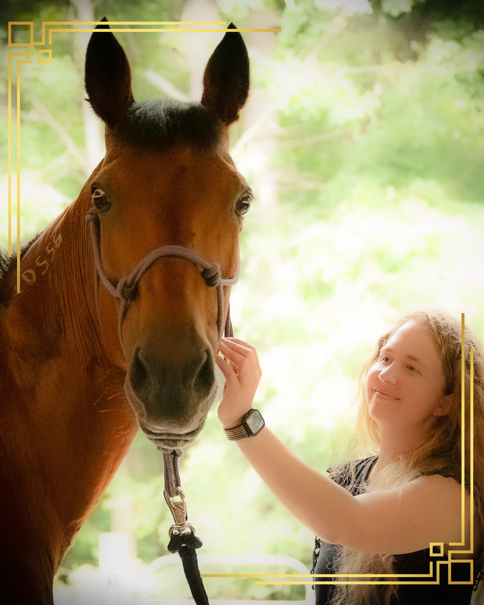 A person resting close beside their horse in a quiet, tender moment of connection during an Eternal Grace session