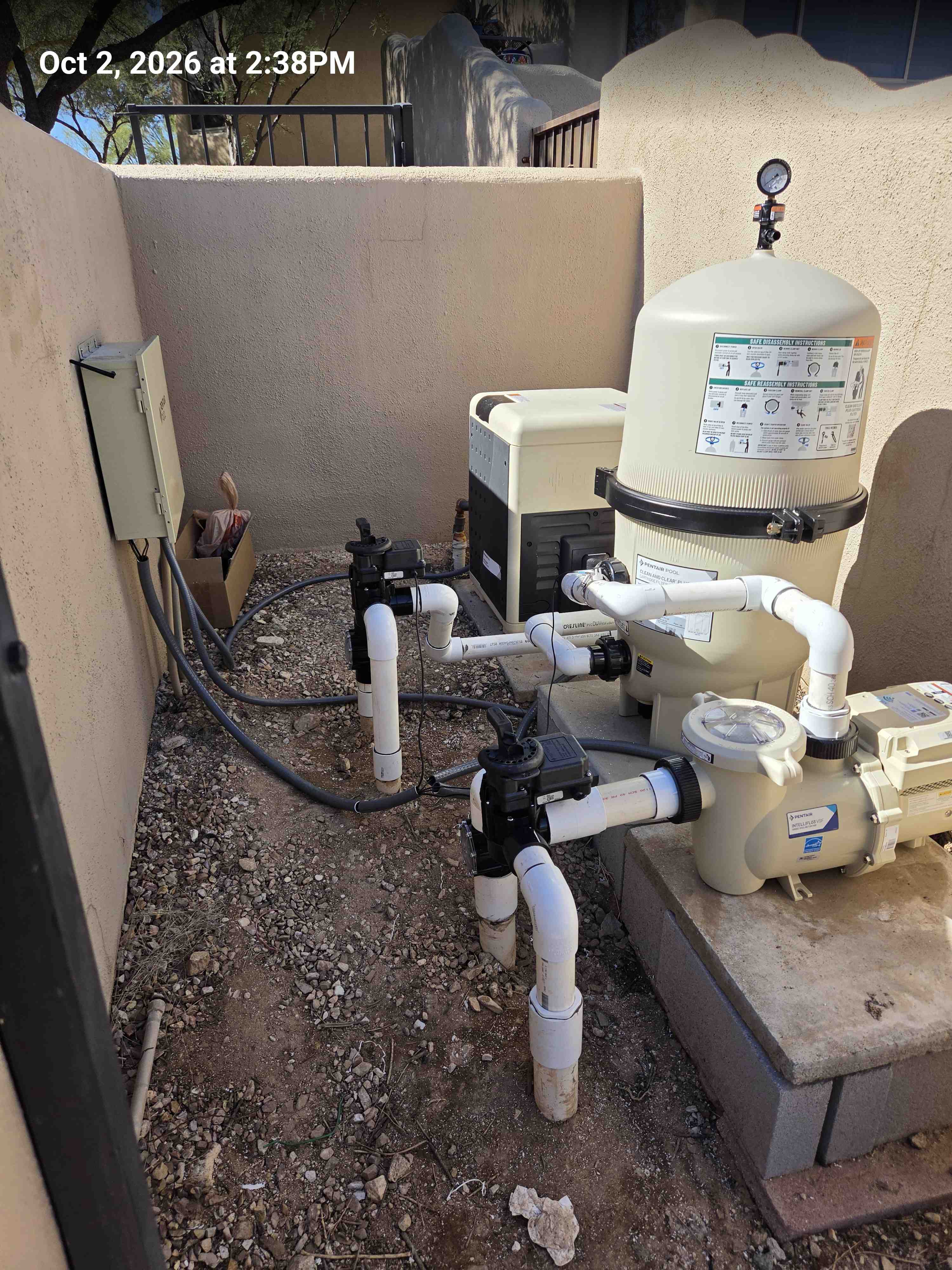 New heater, automation panel, beige cartridge filter, cream pump, and white PVC plumbing, stamped Oct 2, 2026.