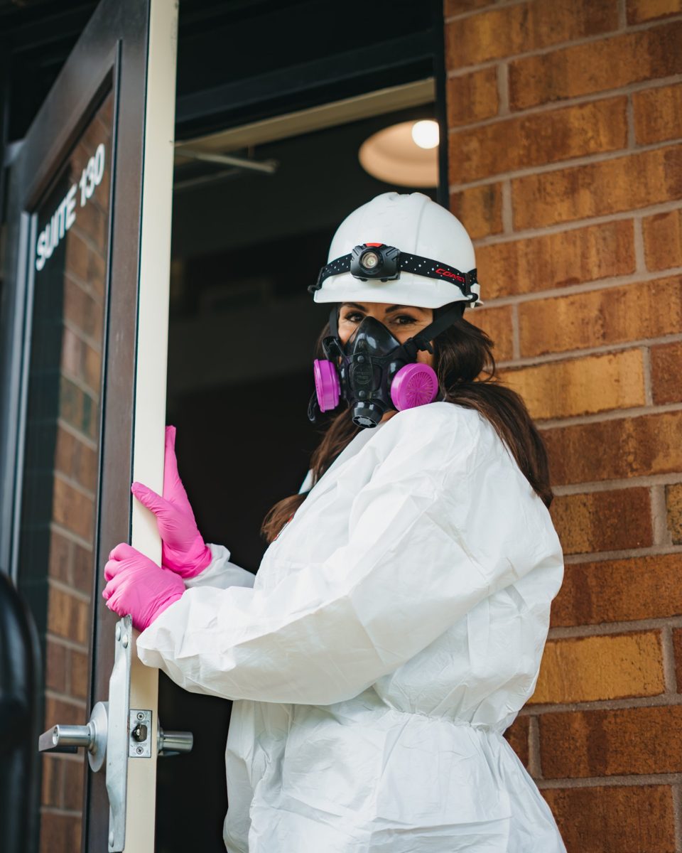Jennifer in protective gear at a job site