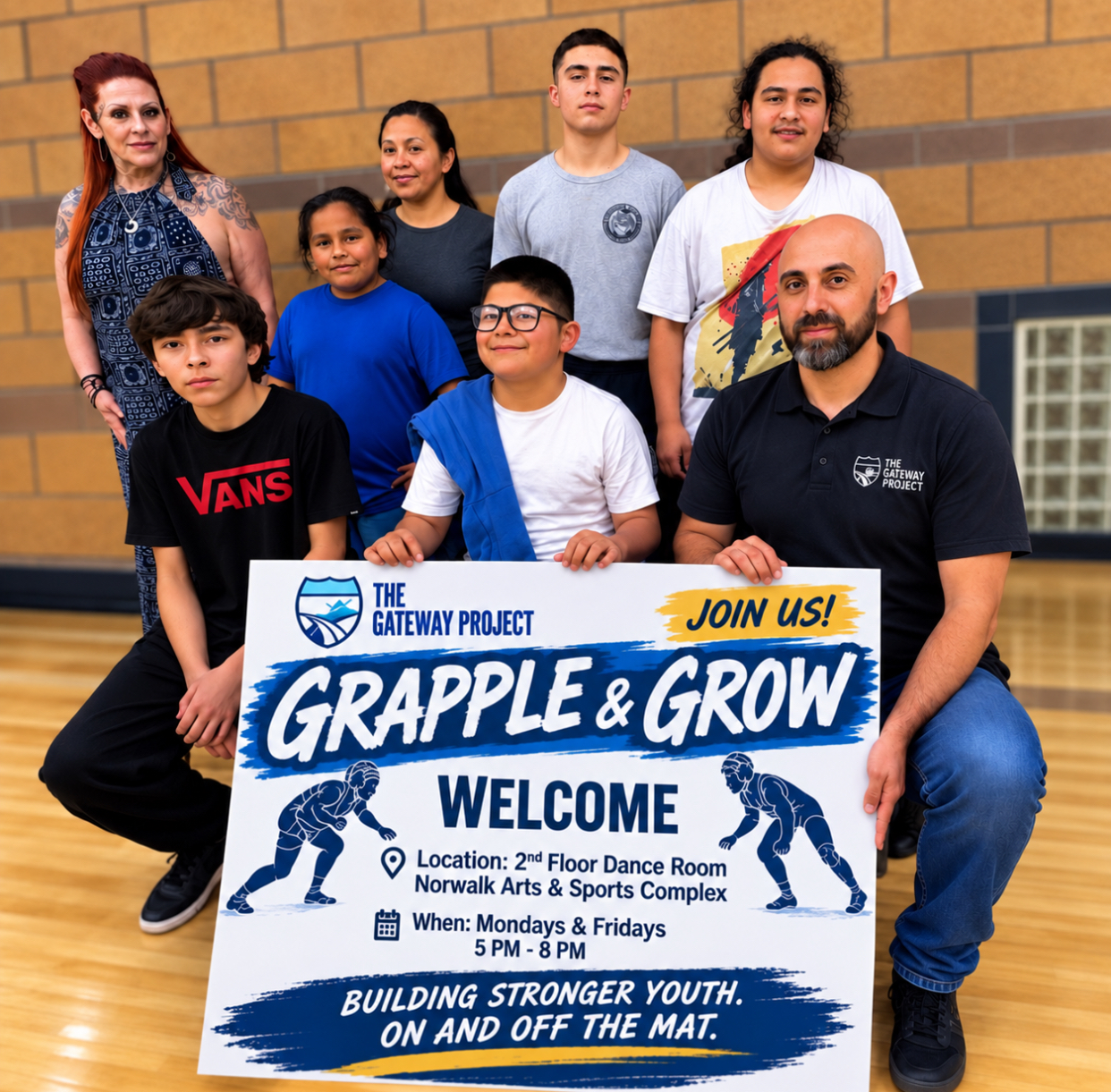 Anthony Armendarez with young people at the Grapple and Grow program