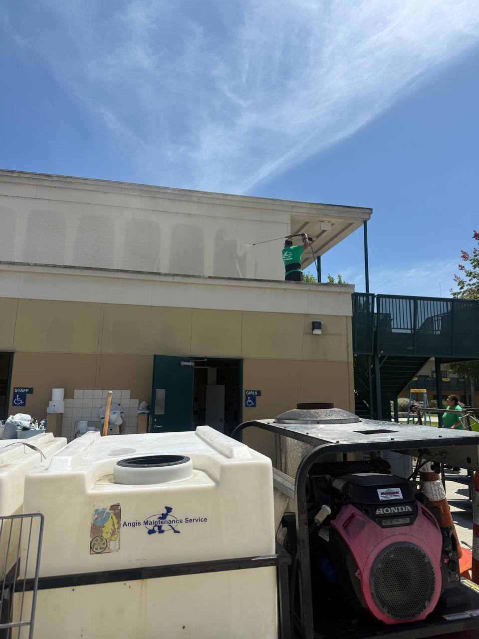 Pressure washing a commercial walkway