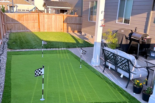 Putting green and artificial turf installation