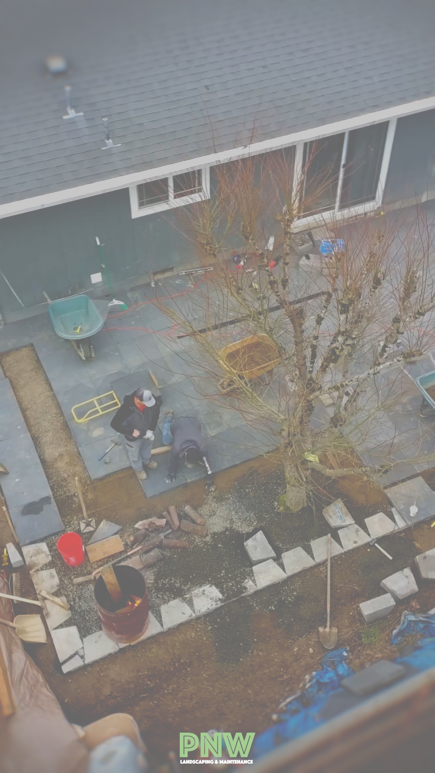 Paver patio build in progress, laying pavers