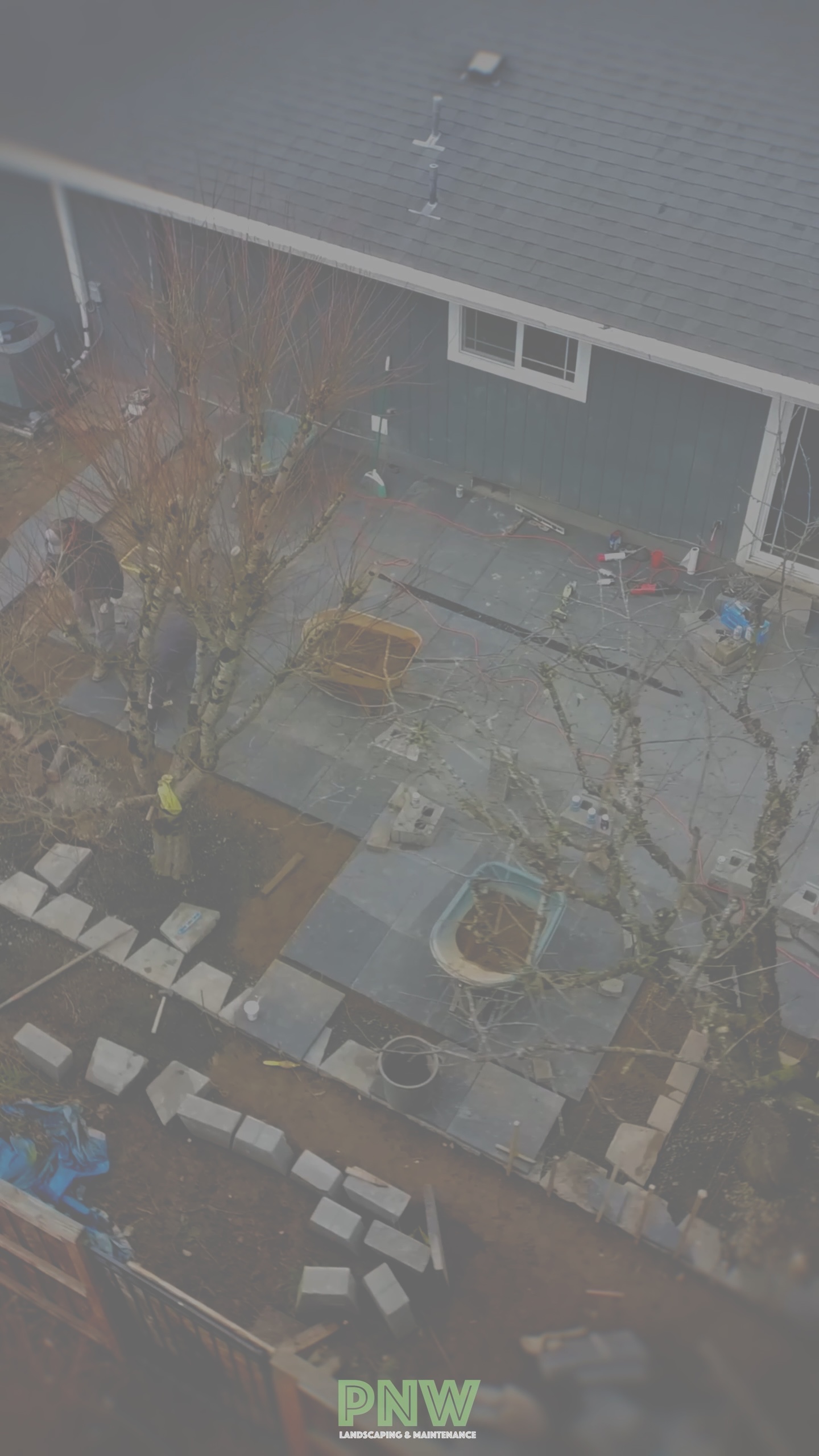 Paver patio overhead view in progress, setting the border