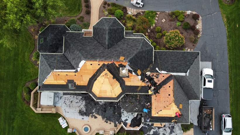 Before: full roof tear-off on a large estate home