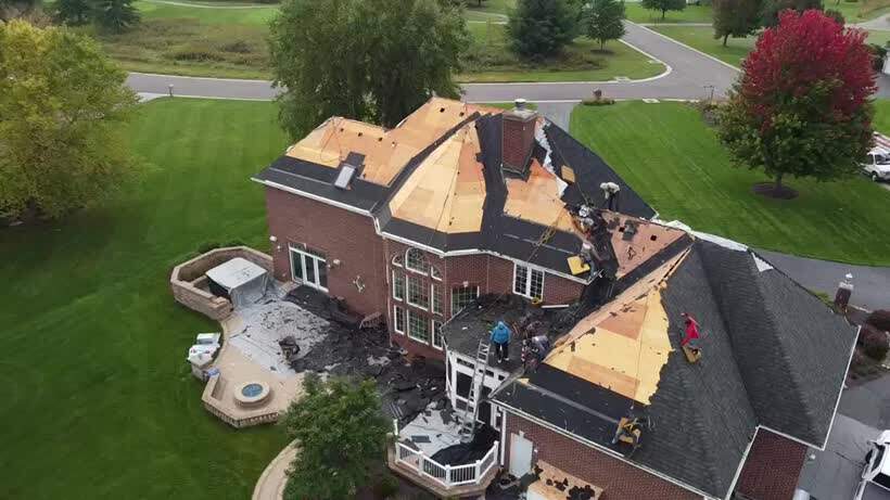 Aerial drone footage of a Skyway roofing project