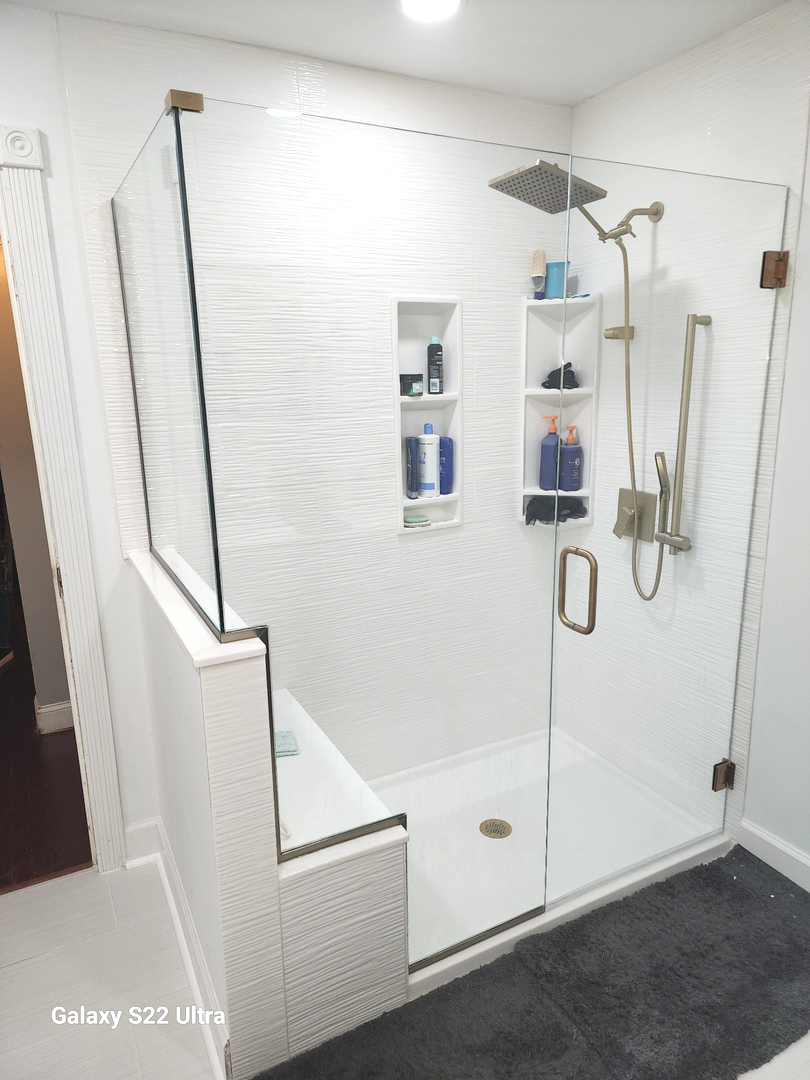 Custom frameless glass shower door installation by Combs Installation Group in London KY