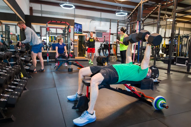 Small group at Yellow Brick Fitness works out together, led by Jeff Caldwell, personal trainer and owner.