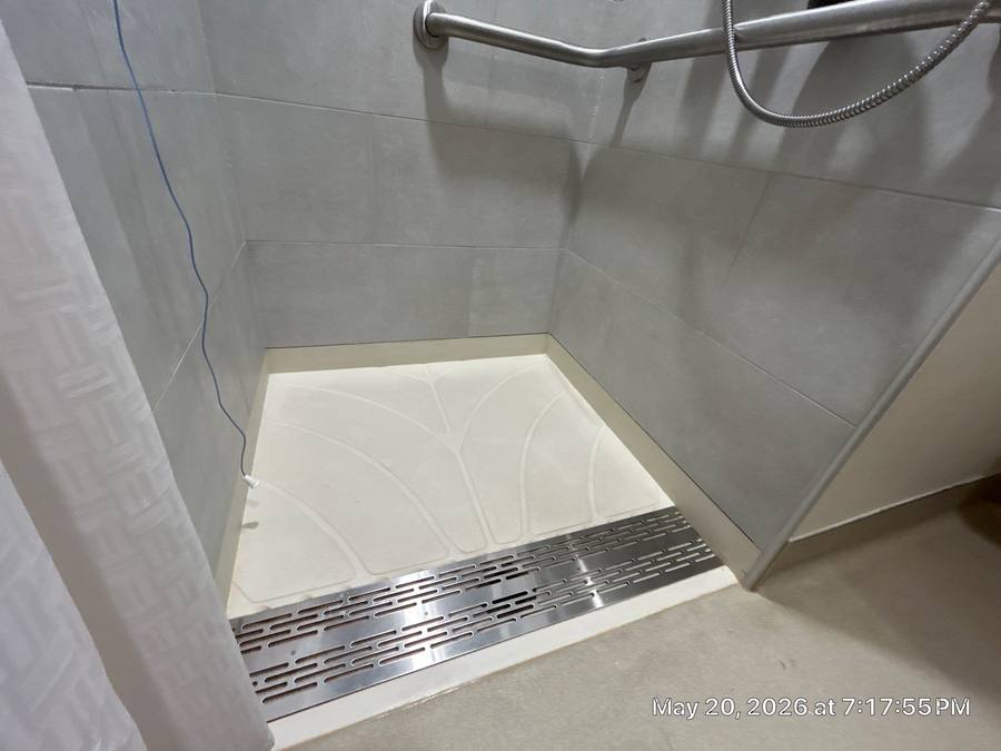 Custom shower remodel with linear drain and modern tile