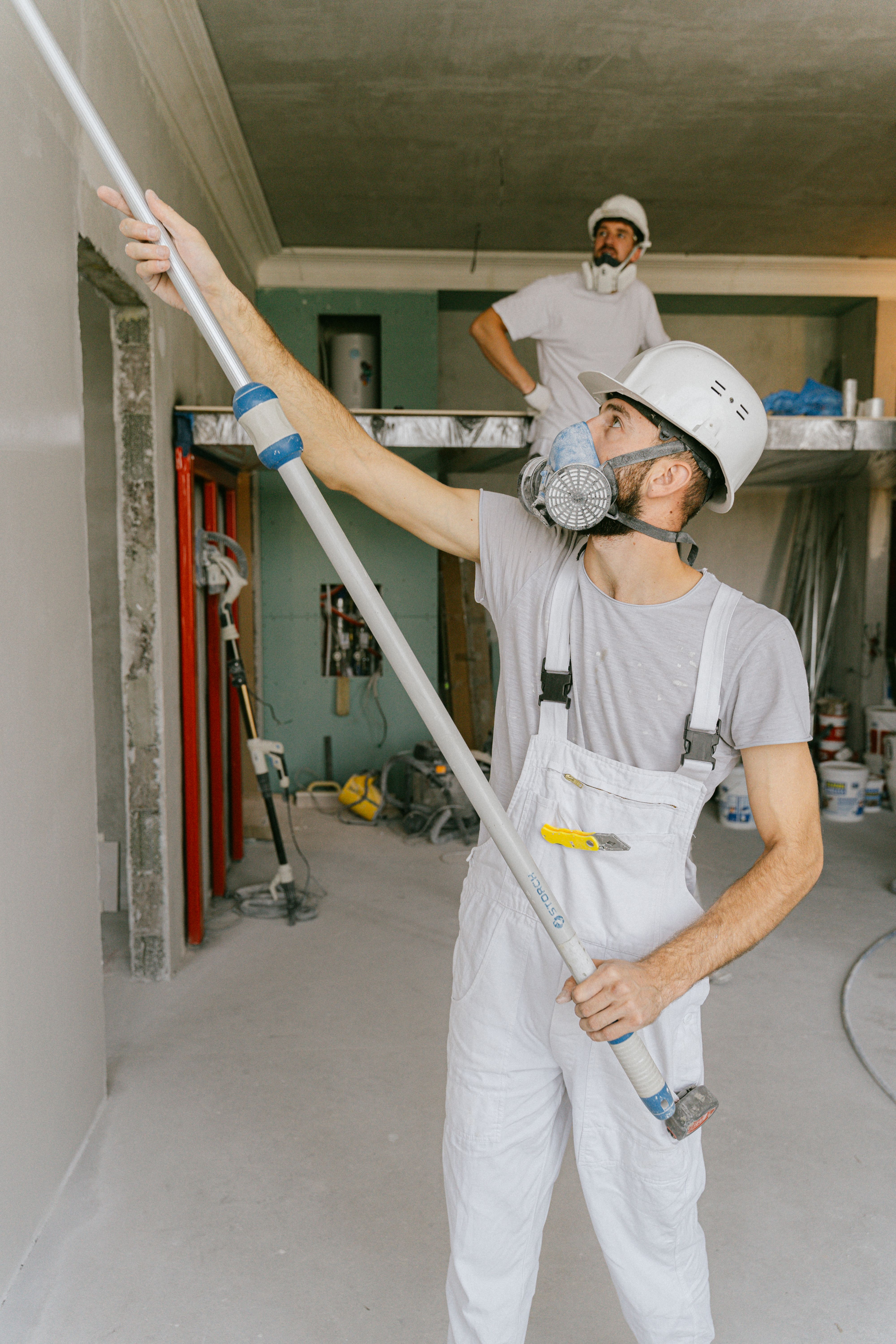 Painter carefully preparing and finishing detailed trim work
