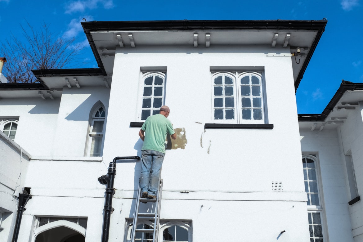 Professional painter preparing a wall