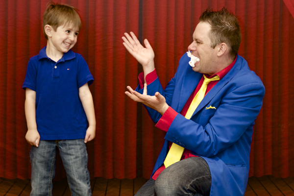 Magician Christopher Cool makes Kids laugh