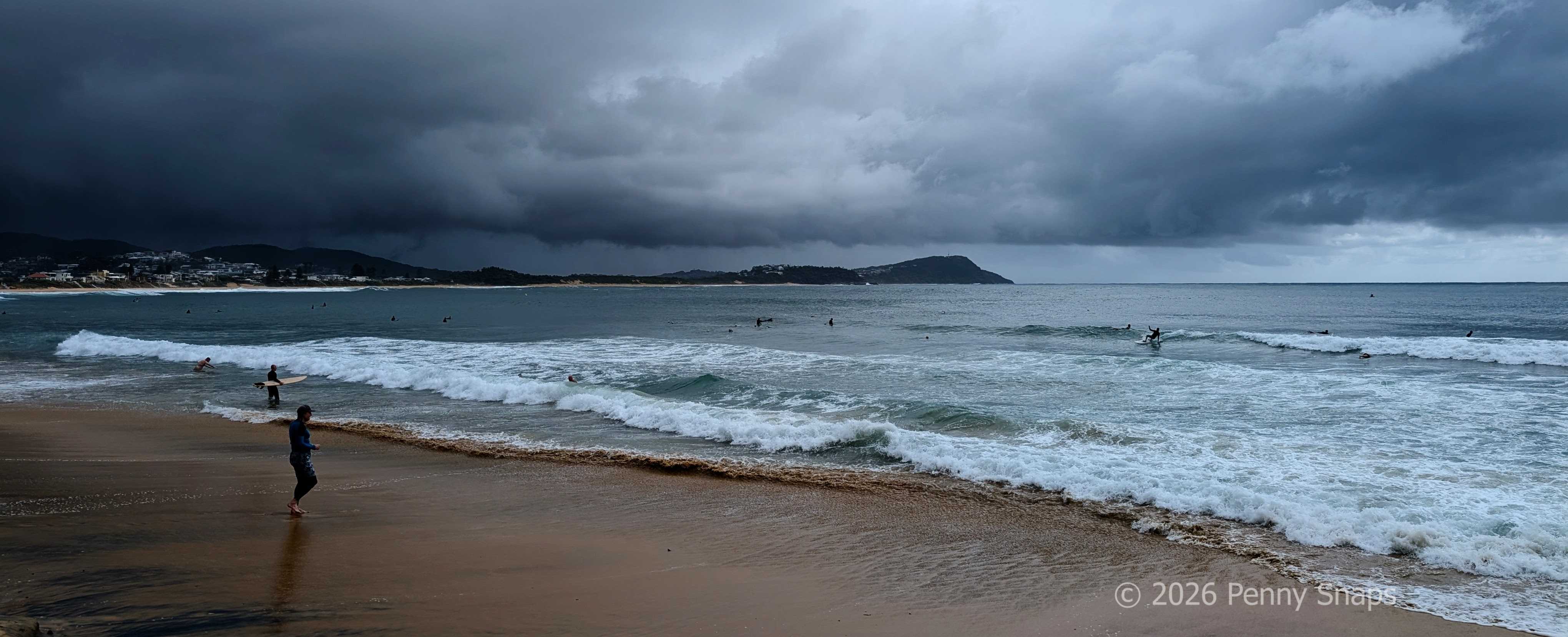 Relaxing on Terrigal Beach (as a storm approaches). Relaxing on Terrigal Beach (as a storm approaches).