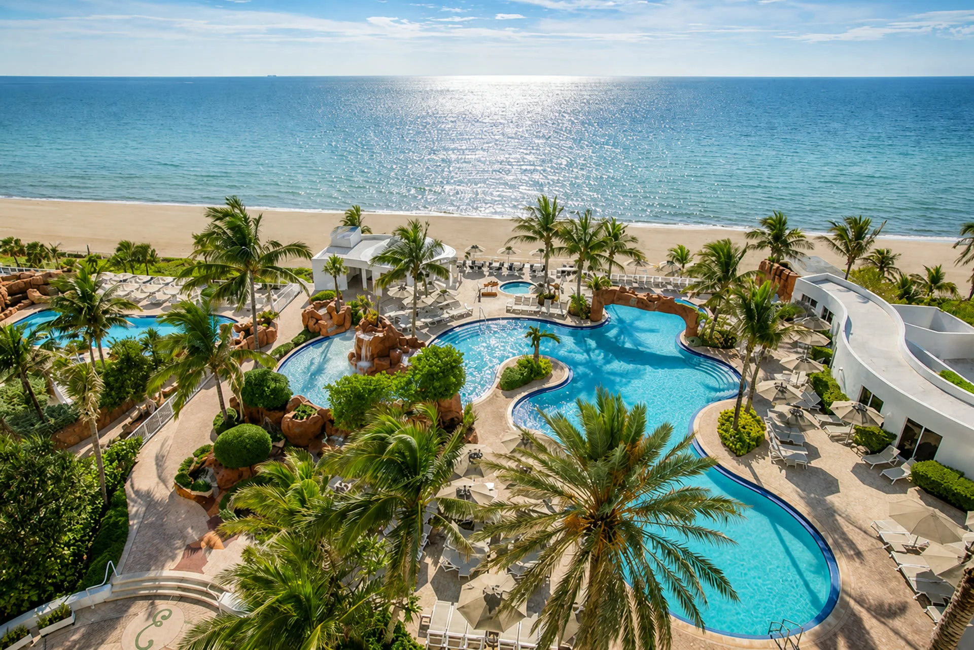 Aerial view of Trump International Beach Resort pools and private beach, Miami Beach