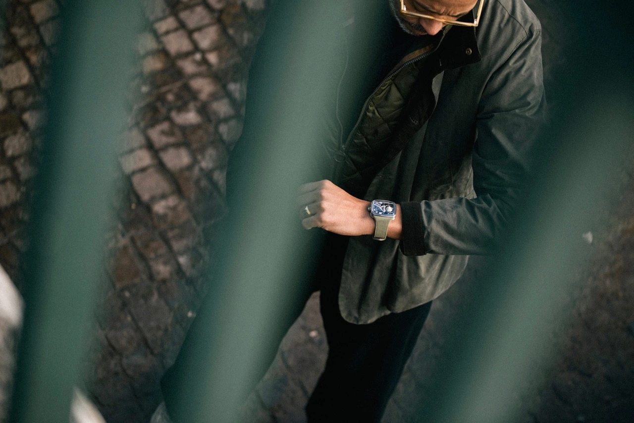 Caseback and strap of the Hautlence Sphere Series 4 highlighting the A82 calibre and olive green suede leather strap