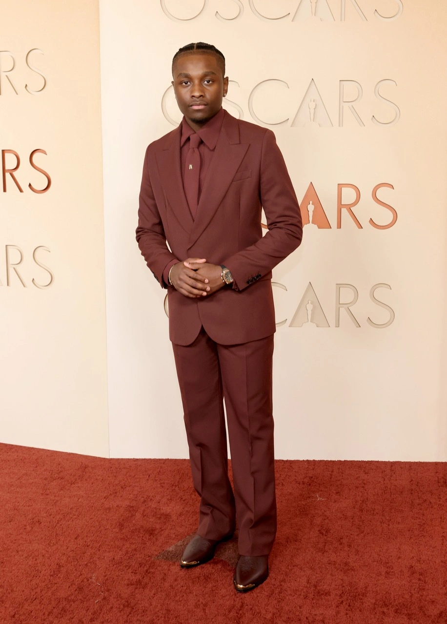 Miles Caton wearing the Hublot Classic Fusion Chronograph Titanium King Gold 45mm at the Academy Awards