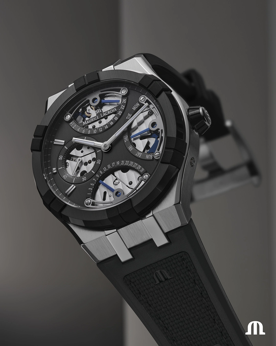Close-up of the Maurice Lacroix AIKONIC Master Triple Retrograde ceramic bezel and stainless-steel case