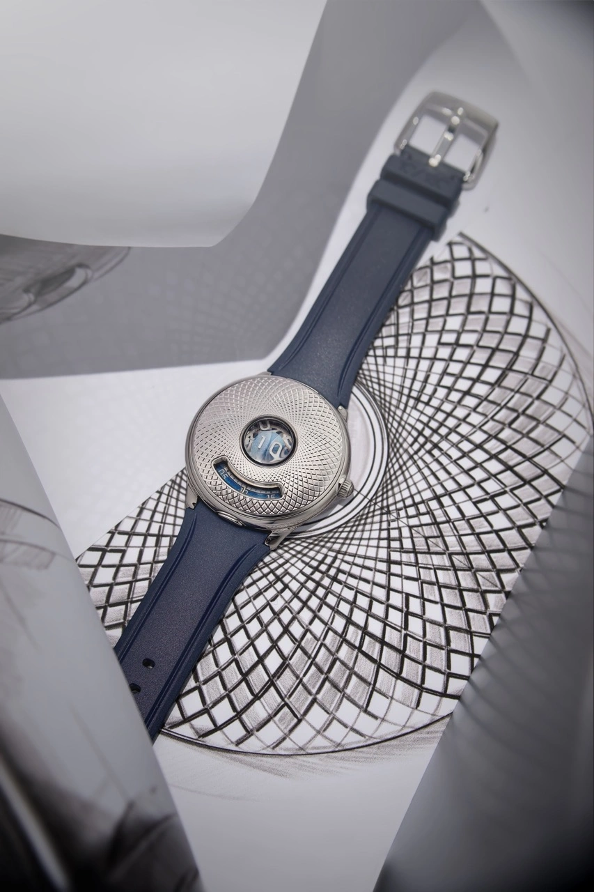 Czapek Time Jumper with half-hunter guilloché cover closed, showing central loupe over the jumping hours
