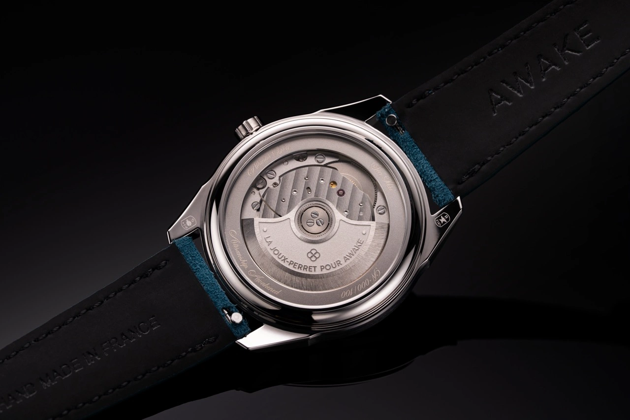 Close-up of the Atlantis Blue vignette dial showing textures and gradients